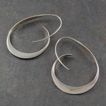 Spiral-shaped earrings – Fluid form