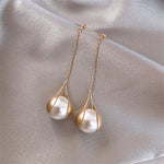 Earrings with pearls in gold – Timeless style