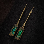 Green lantern pendant earrings in gold – refined style
