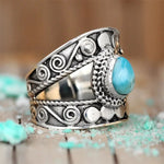 Turquoise drop openwork ring – luxurious appeal