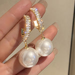Luxury earrings with pearls and zircon stones – Refined elegance