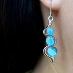 Silver boho blue spheres pendant earrings – Playful elegance