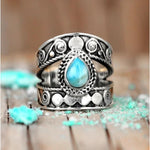 Turquoise drop openwork ring – luxurious appeal