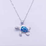 Sea turtle necklace made of blue opal – Marine charm