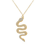 Snake pendant made of gold and diamonds with brilliants – Bold luxury