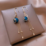 Festive earrings with blue pearls – Holiday glow