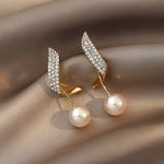 Pearl earrings in gold – Classic elegance