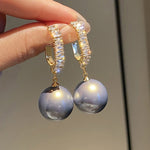 Luxury earrings with pearls and zircon stones – Refined elegance