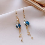 Festive earrings with blue pearls – Holiday glow