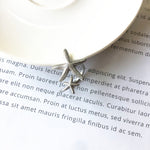 Adjustable starfish ring in silver and gold – Ocean accent