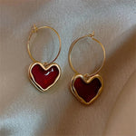 Heart earrings in gold – Classic motif