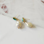 Luxurious gold earrings with pearls and green zirconia – refined style