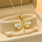 Dragonfly necklace made of gold with opal – Delicate glow