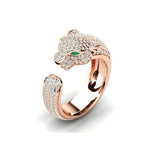 Adjustable jaguar ring made of 18K silver and 18K rose gold with green zirconia eyes – Striking design